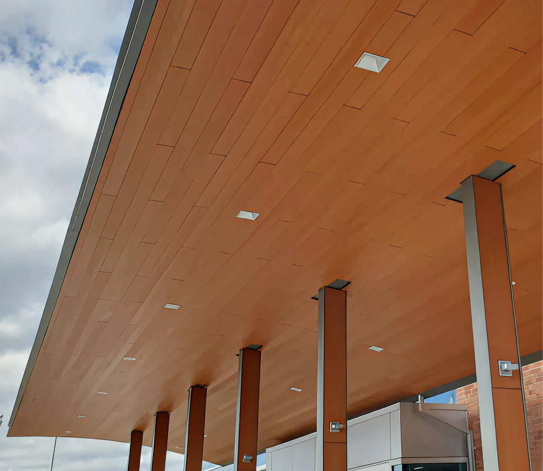 Resysta wood-alternative ceiling panels in an outdoor commercial space